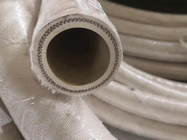 A white fire sleeve is made up of three layers